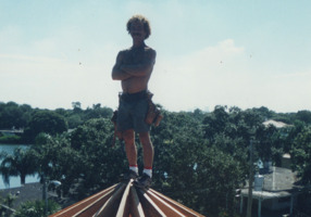 Todd Coash, president of 
NORTH STAR CONSTRUCTION & REMODELING CO. INC. CRC1330674, standing on top of a spire he built. On this job he became lead carpenter on a ten thousand square foot house right on Tampa bay. In charge of a crew of six carpenters. Circa. 2001