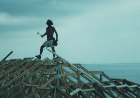 Todd Coash, president of 
NORTH STAR CONSTRUCTION & REMODELING CO. INC. CRC1330674, standing on top the roof of the ten thousand square foot house overlooking Tampa bay. Todd was lead carpenter on this job. Circa. 2001