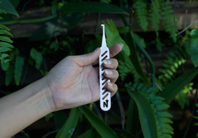 In hand photo graph of the stainless large variant of the North Star 4000. 